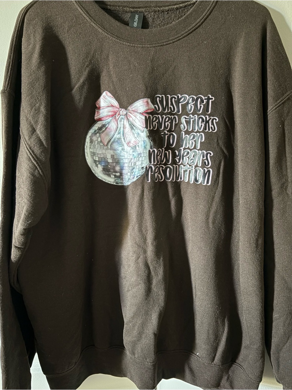 Gildan Brown Graphic Sweatshirt - 'Suspect Never Sticks'